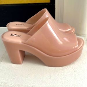 Never worn mule platform clogs. Heel is 3.5inch with 1.5 inch platform.